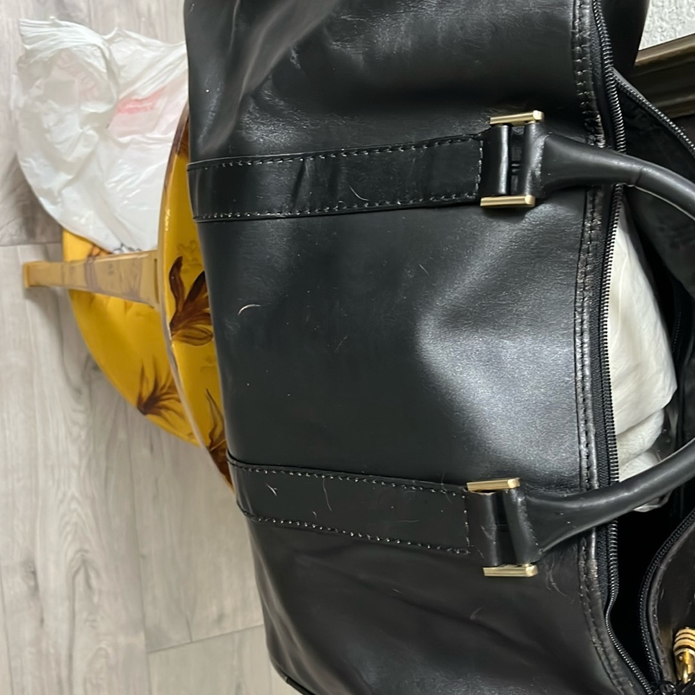 Deja leather duffle bag